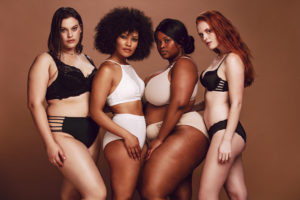 Body Confidence - 4 women on a fashion shoot - diverse in colour and size